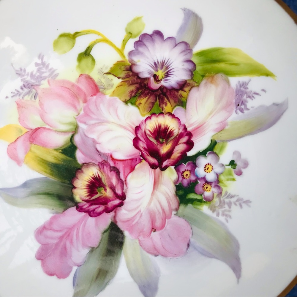 Noritake bowl on pedestal. Hand painted flowers. Beautiful colors